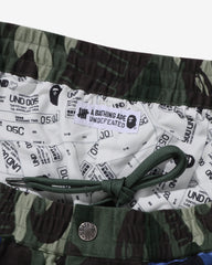 BAPE X UNDEFEATED COLOR CAMO FLANNEL PANTS