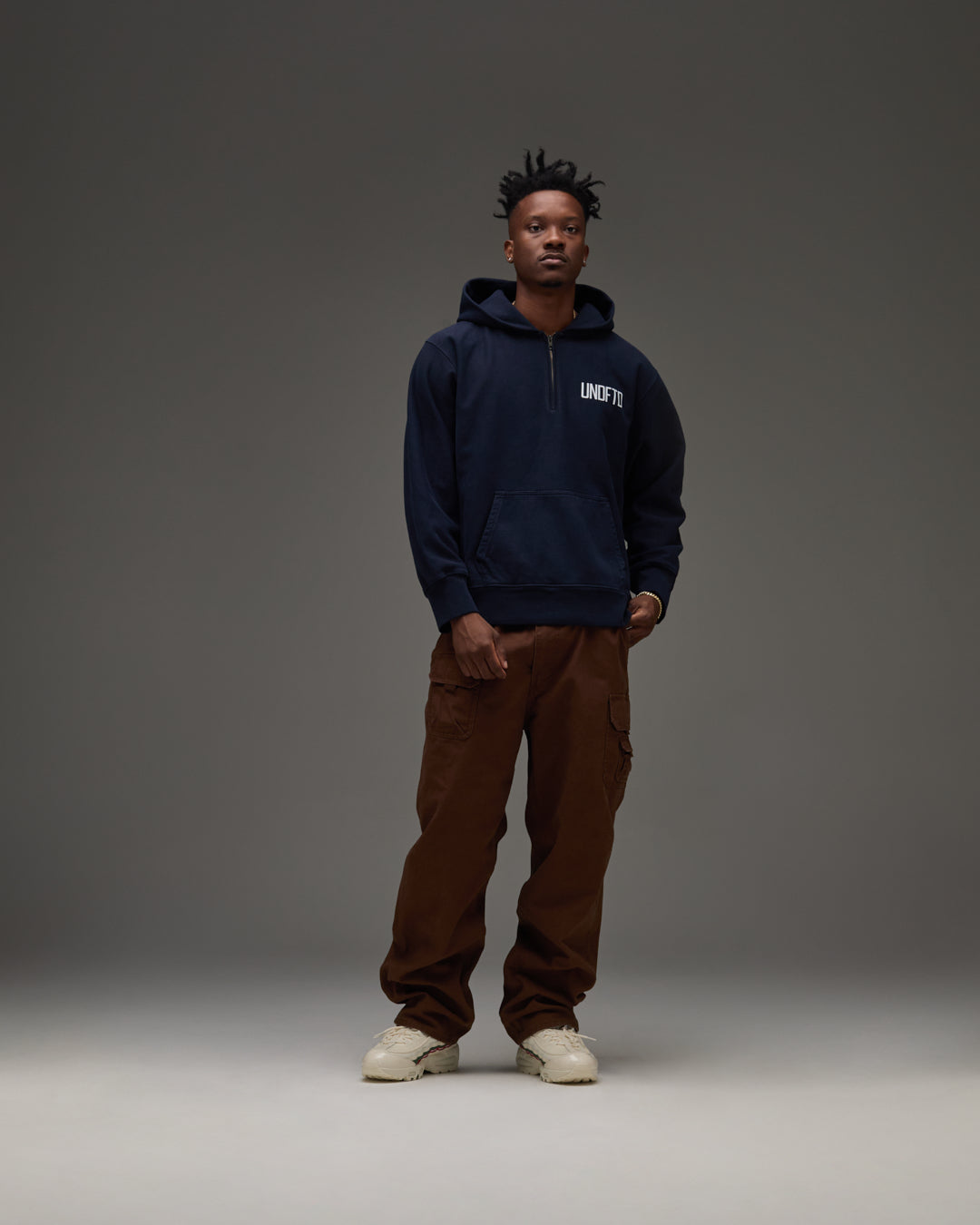 UNDEFEATED QUARTER ZIP PULLOVER HOOD