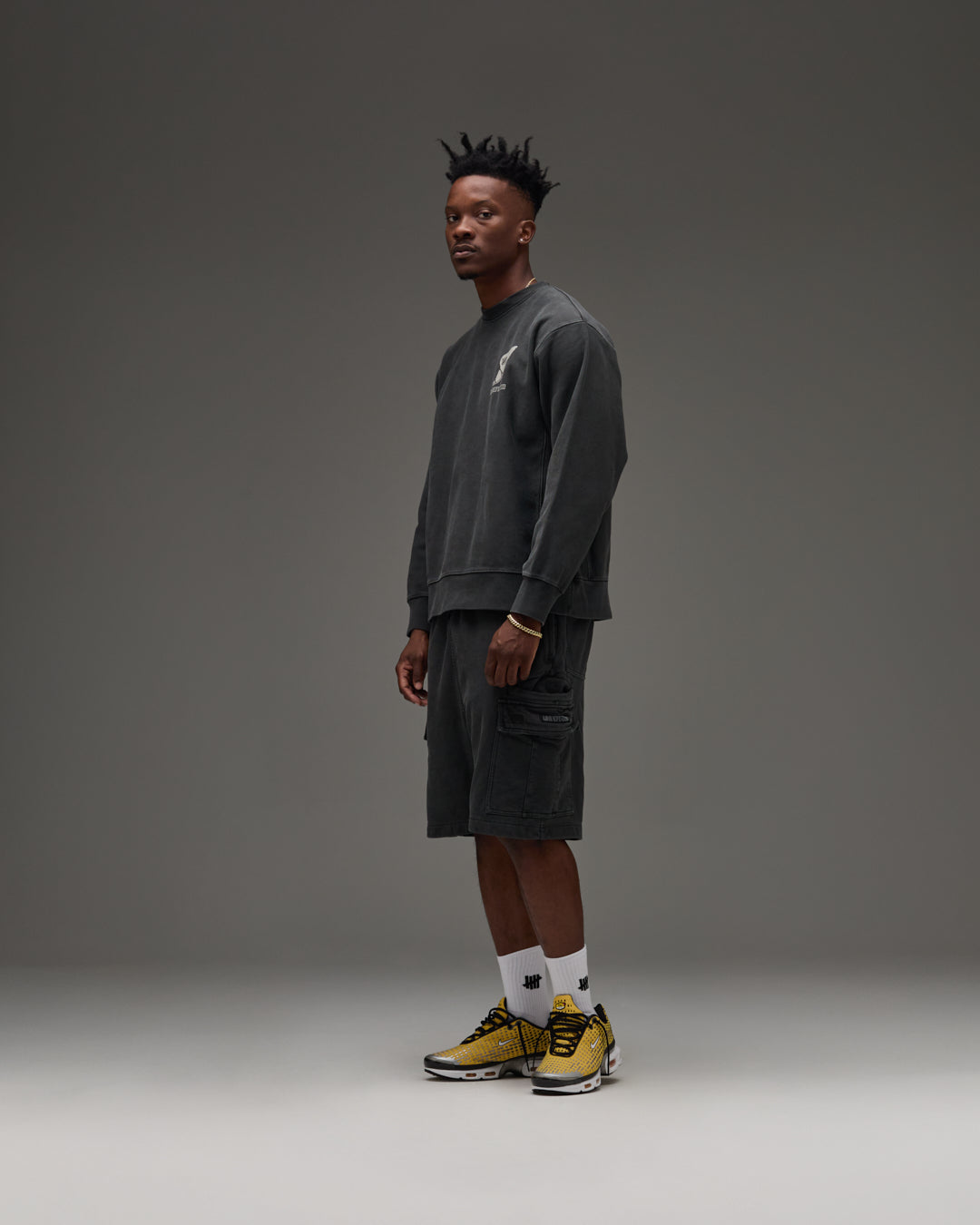 UNDEFEATED TRACK CREWNECK