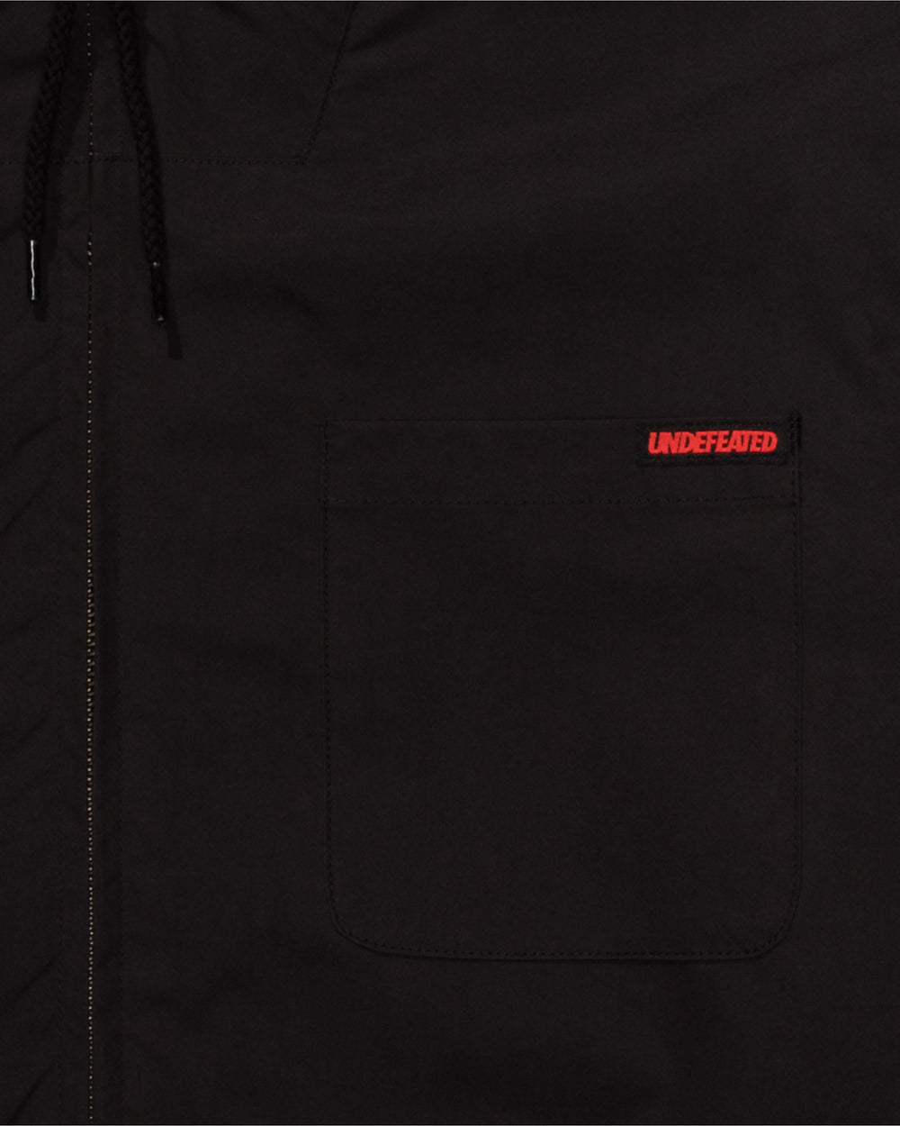 UNDEFEATED HOODED LIGHTWEIGHT WOVEN JACKET - BLACK