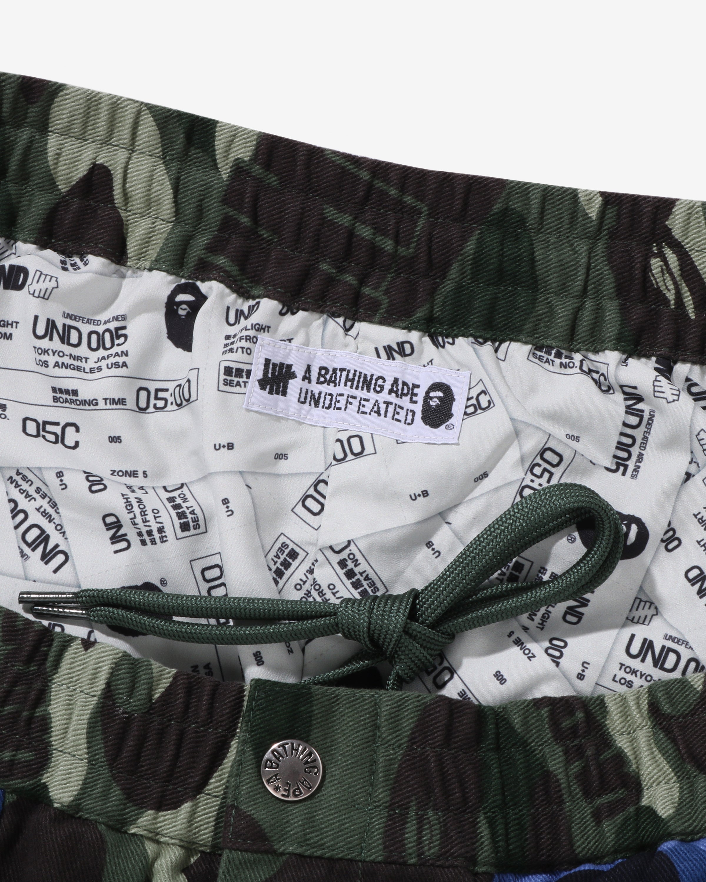 BAPE X UNDEFEATED COLOR CAMO FLANNEL PANTS