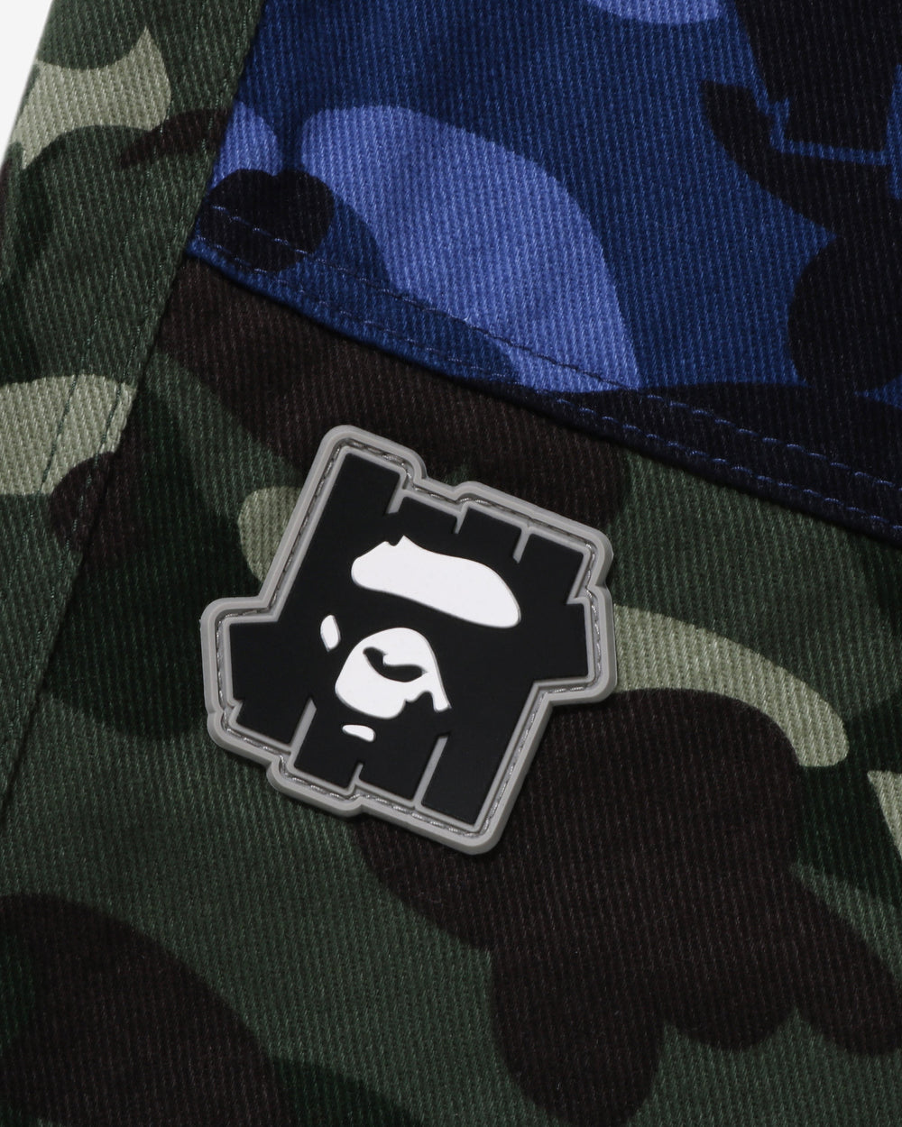 BAPE X UNDEFEATED COLOR CAMO FLANNEL PANTS