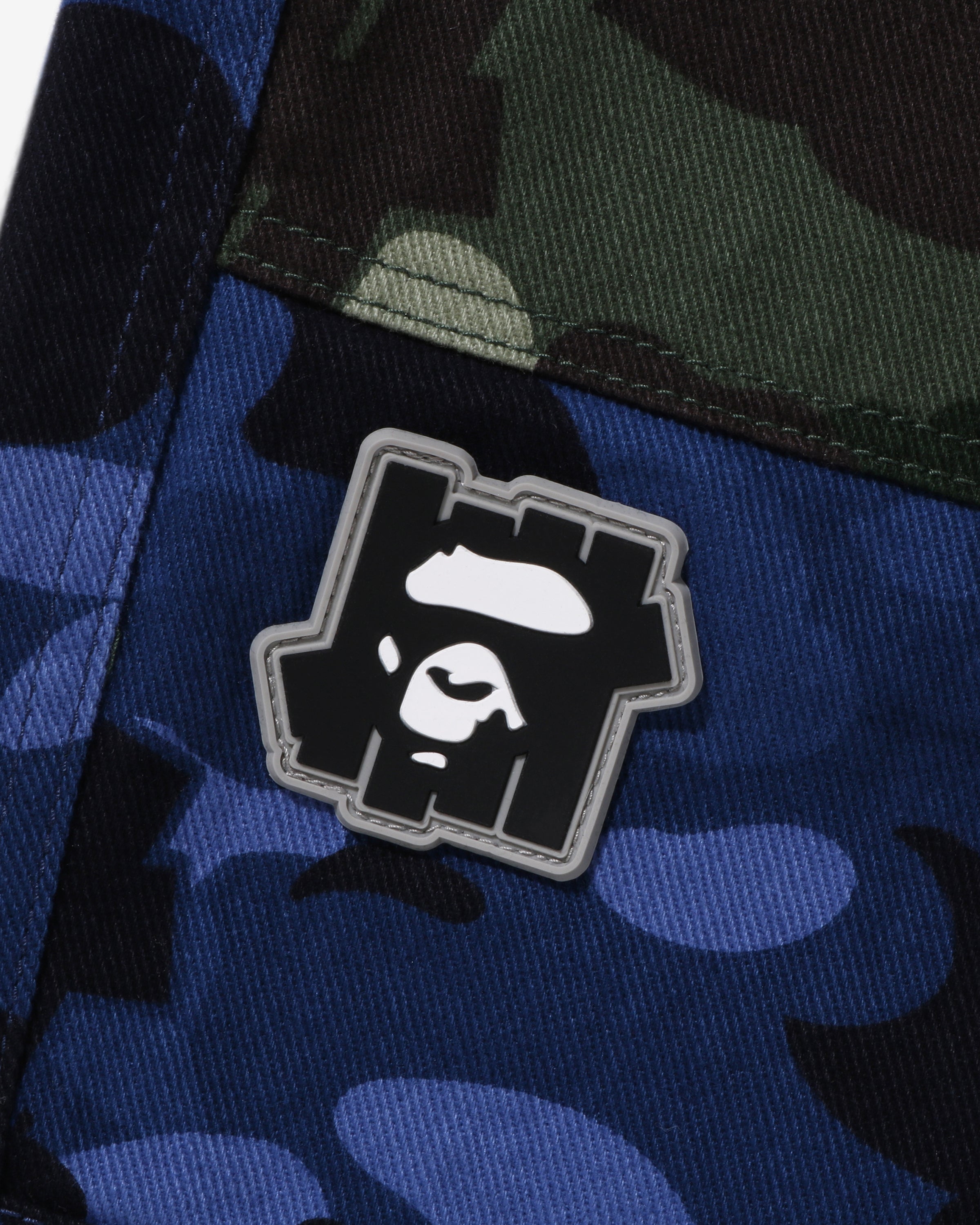 BAPE X UNDEFEATED COLOR CAMO FLANNEL PANTS