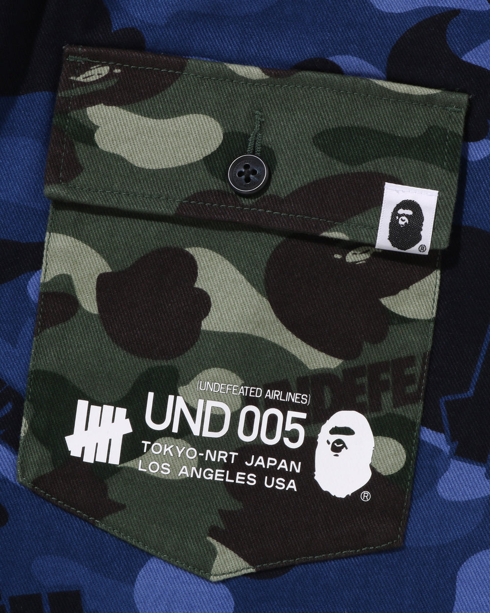 BAPE X UNDEFEATED COLOR CAMO FLANNEL PANTS